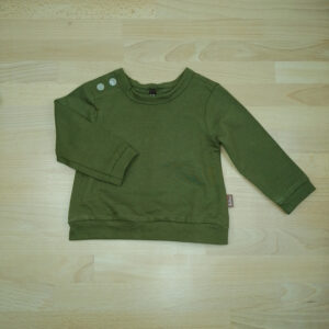 Groene tricot sweater voor baby